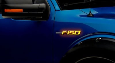 Ford F150 Illuminated Emblems 2-Piece Kit Includes Driver & Passenger Side Fender Emblems in Black Case - F150 in Amber Illumination F150AMBK