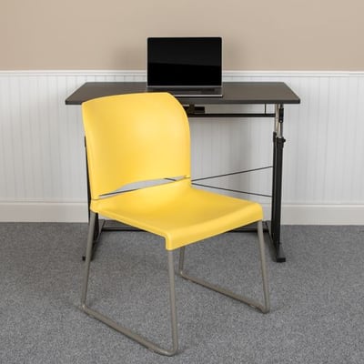 HERCULES Series 880 lb. Capacity Yellow Full Back Contoured Stack Chair with Gray Powder Coated Sled Base